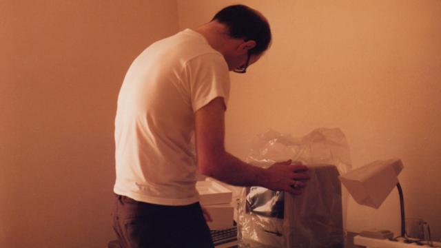Bryce Wray, in 1984, unwrapping his new Macintosh computer Bryce Wray, in 1984, unwrapping his new Macintosh computer