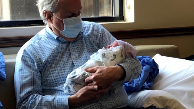 Bryce Wray holds his grandson, Dylan Everett Beck, shortly after the child’s birth Bryce Wray holds his grandson, Dylan Everett Beck, shortly after the child’s birth